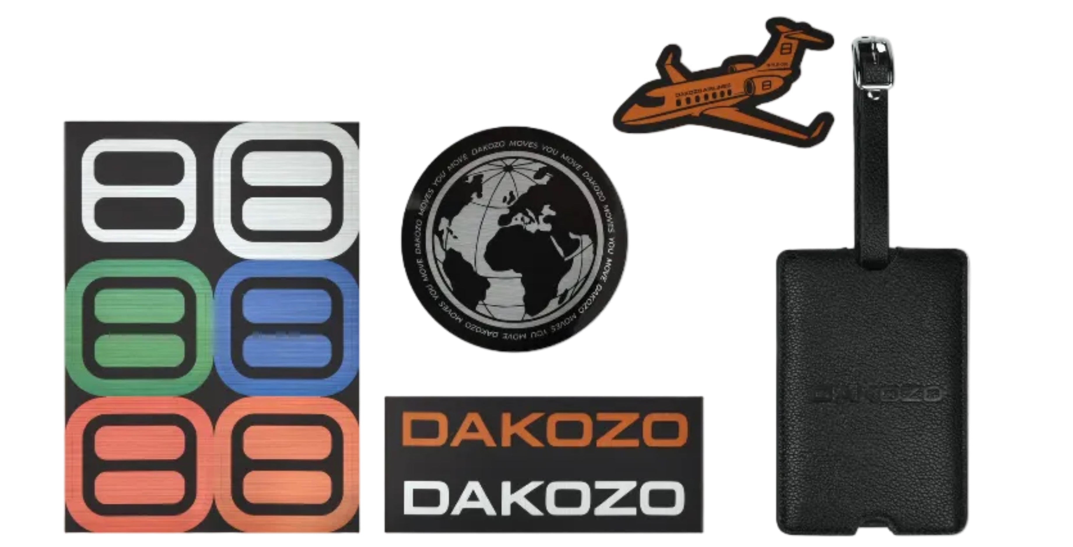 Collection of Dakozo products including a luggage tag, airplane model, and stickers on a white background.